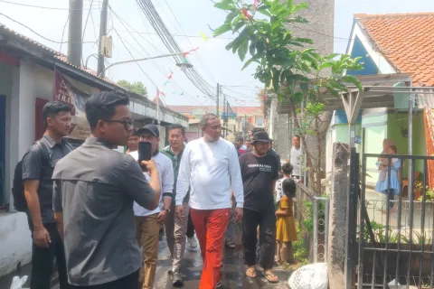 Bhabinkamtibmas Medansatria Bersama Wali Kota Bekasi Bahas Penanganan Banjir Tanah Apit